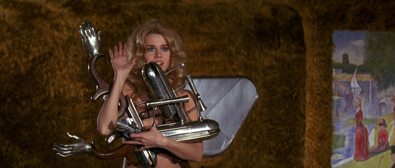 Illustration for article titled Barbarella Caps, Clips and Photos